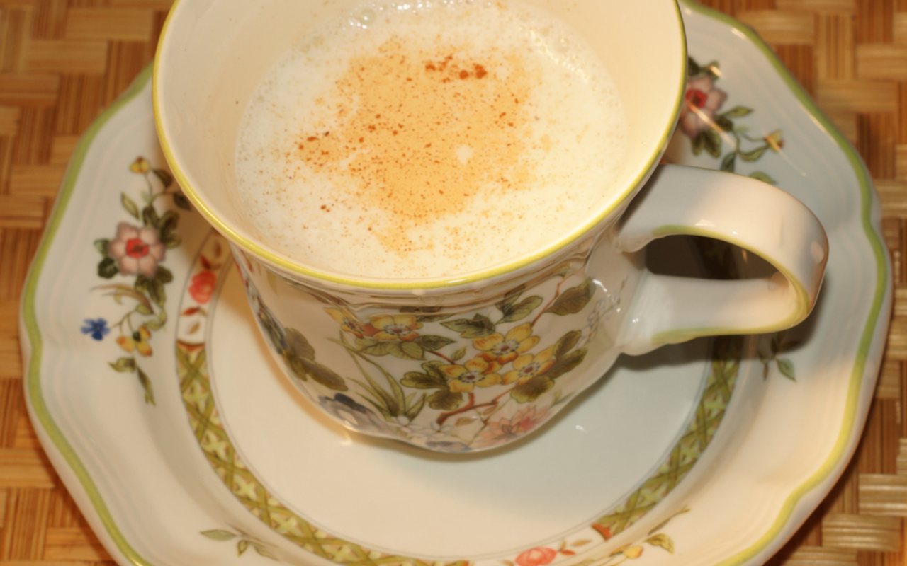 Two small cups of thick hot salep dusted with ground cinnamon