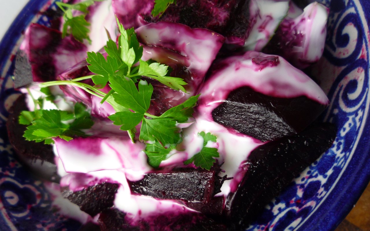 Beet pieces folded with garlic yogurt and parsley