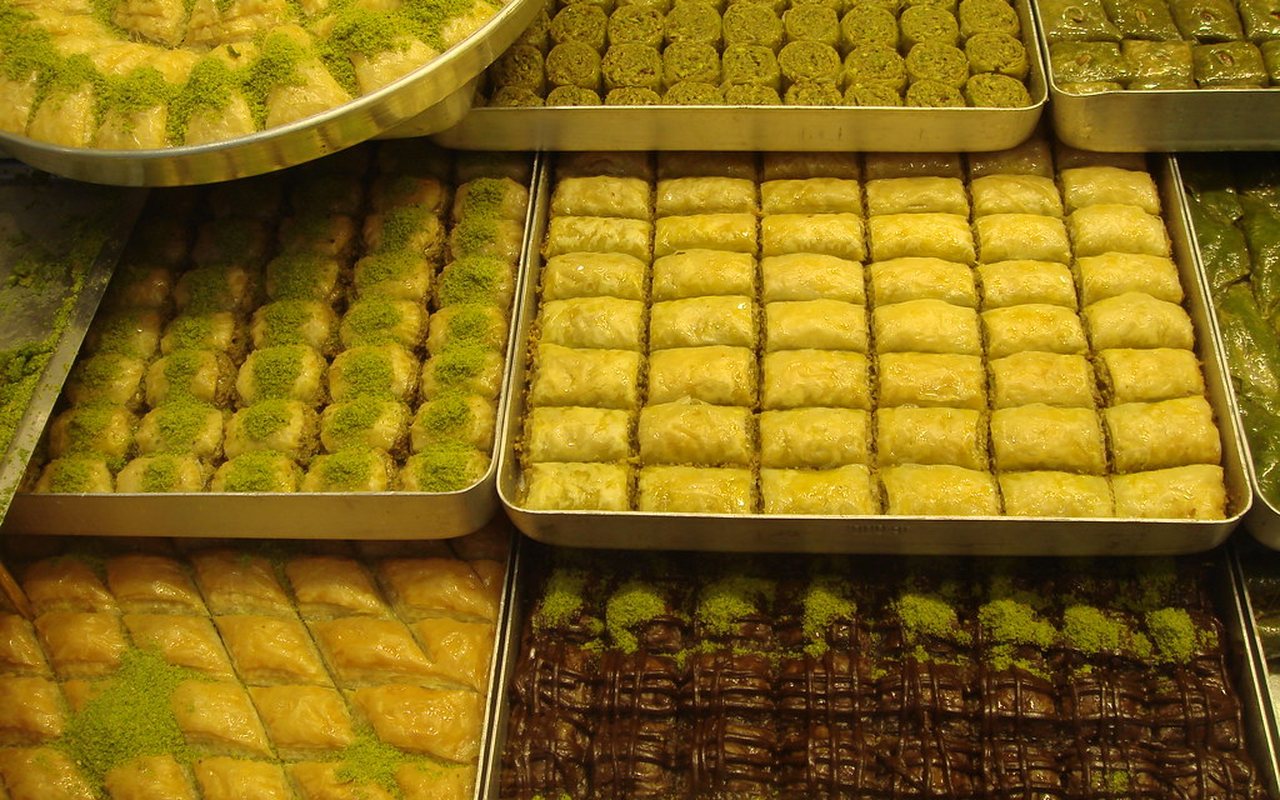Diamond-cut pistachio baklava in a baking tray