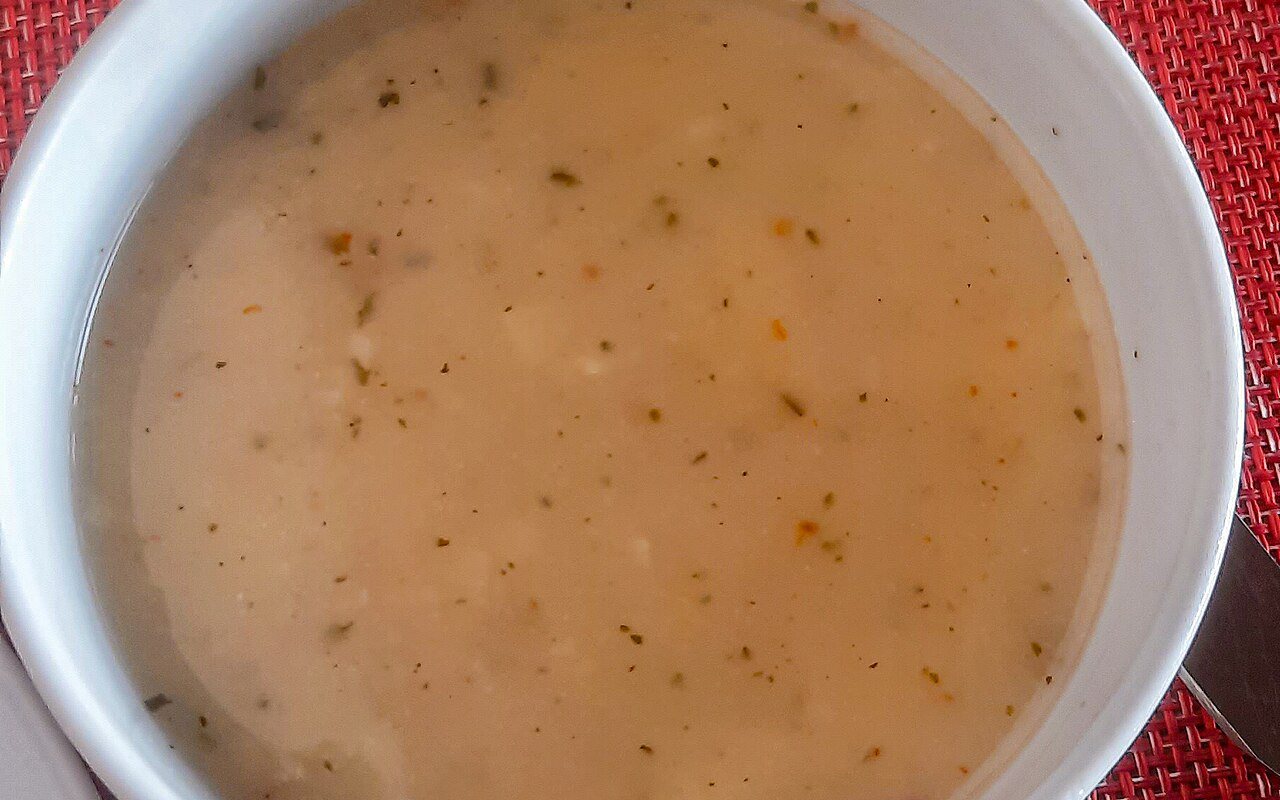 Creamy Turkish yogurt and rice soup flecked with dried mint