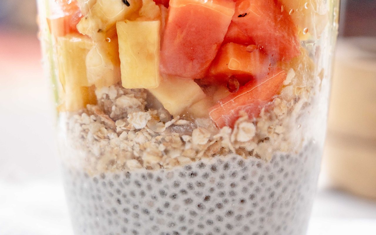 Chia pudding served in a glass with fresh fruit