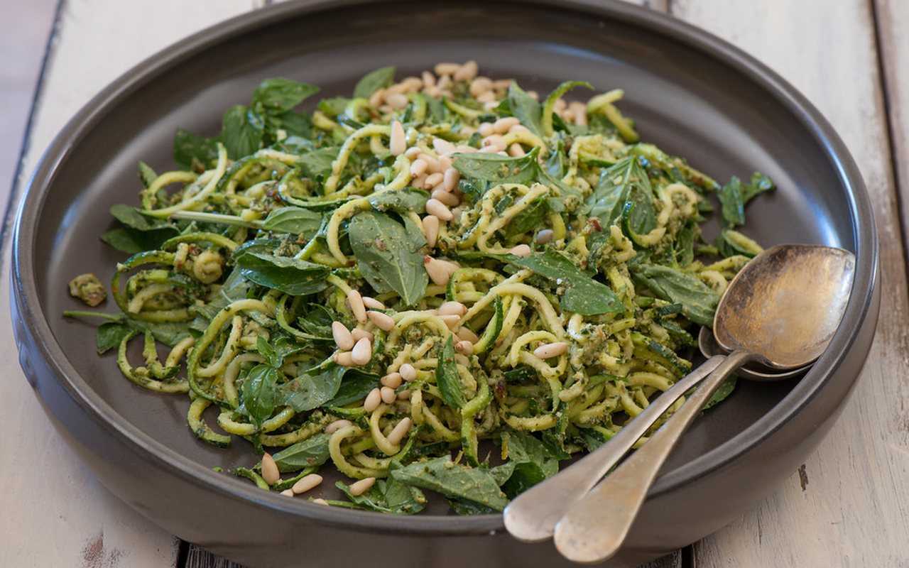 Zucchini noodle salad with cherry tomatoes, basil, and Parmesan
