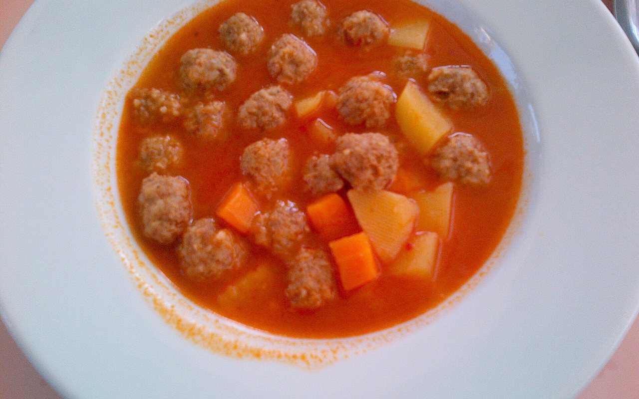 Turkish meatball and potato stew in a shallow bowl