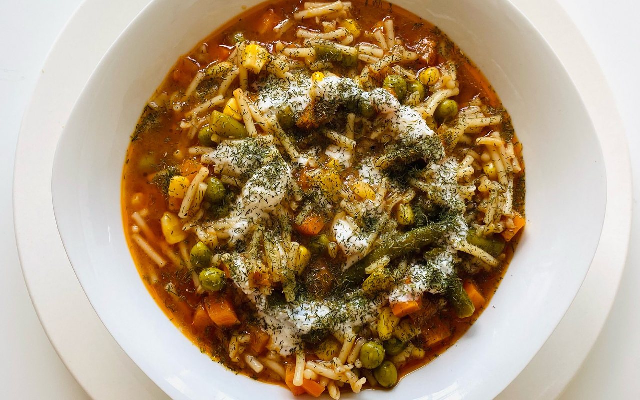 Chunky vegetable soup with tiny diced vegetables and vermicelli
