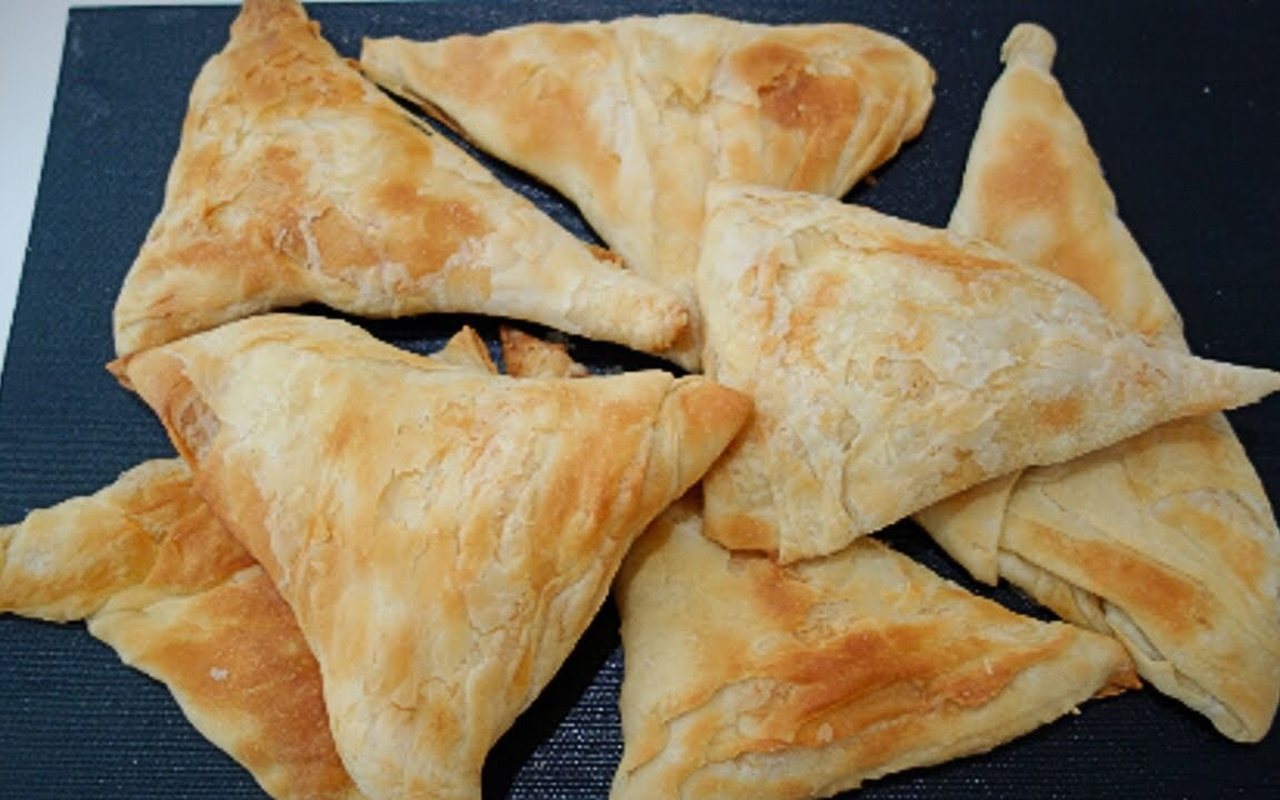 Golden triangular muska böreği pastries filled with cheese